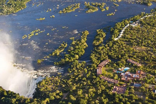 Aerial view of a waterfall and surrounding landscape.